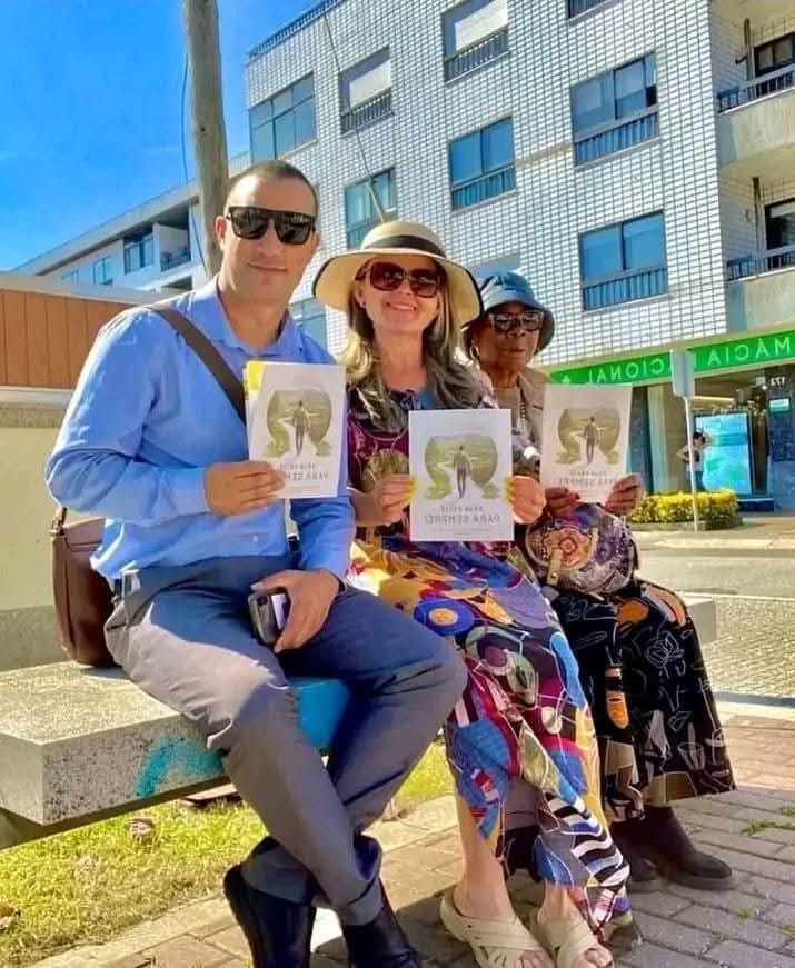 Members sharing Bible-based literature in the community